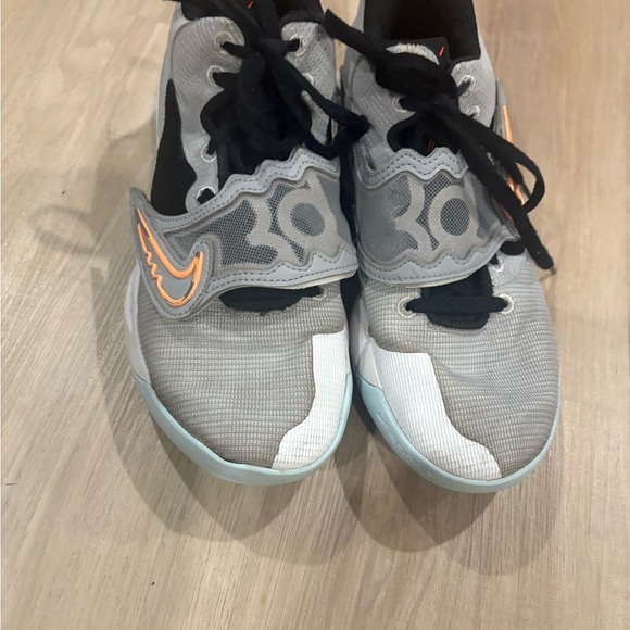 Nike Gray and Orange Athletic Shoes with Modern Design - Picture 1 of 7